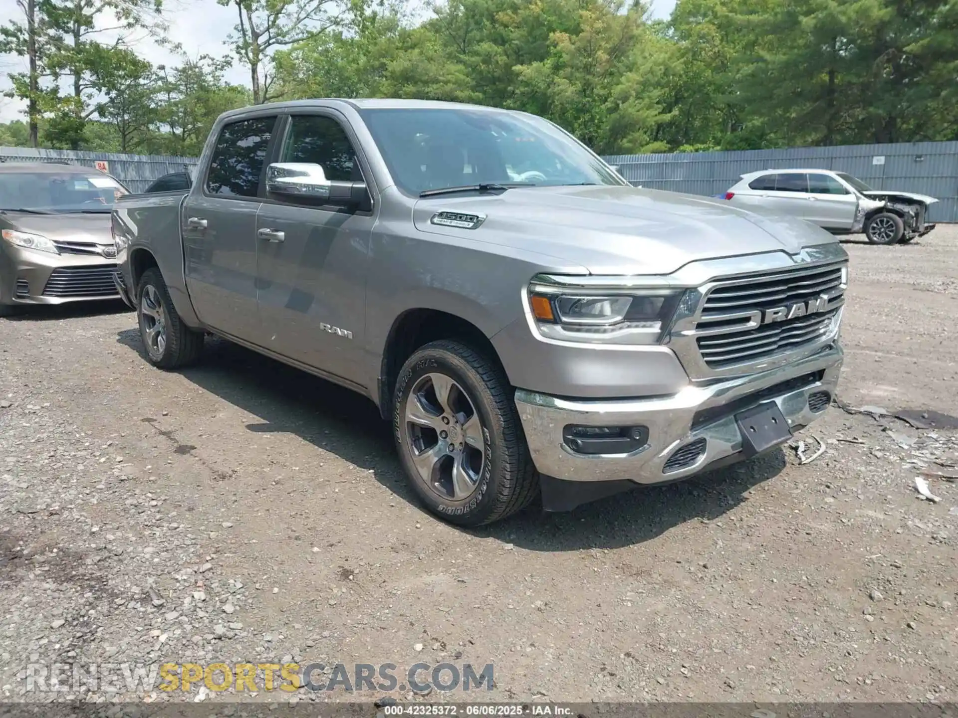 1 Photograph of a damaged car 1C6SRFJT0PN668461 RAM 1500 2023