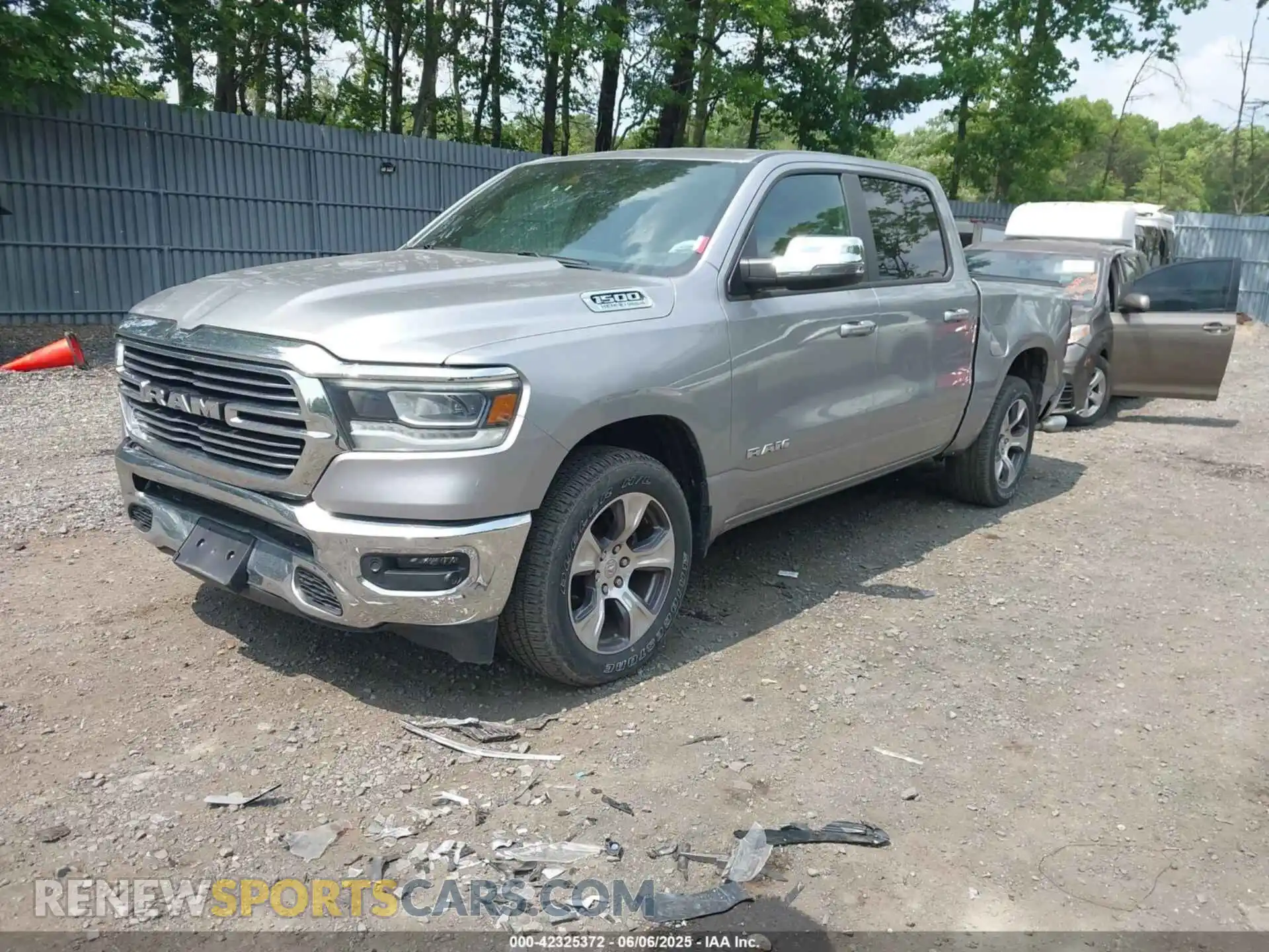 2 Photograph of a damaged car 1C6SRFJT0PN668461 RAM 1500 2023