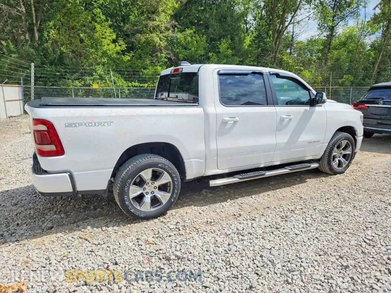 3 Photograph of a damaged car 1C6SRFJT2PN520053 RAM 1500 2023