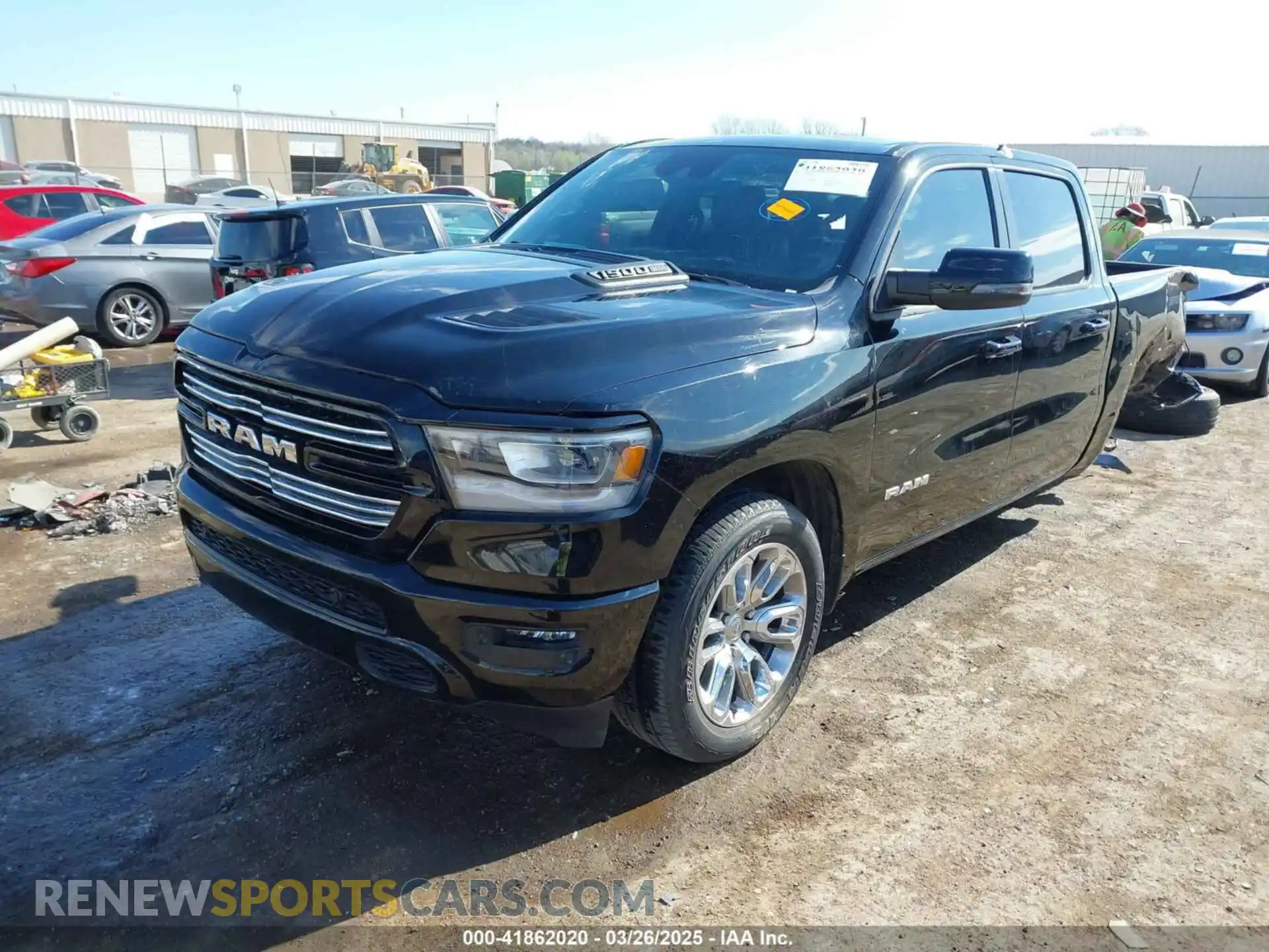 2 Photograph of a damaged car 1C6SRFJT2PN525673 RAM 1500 2023