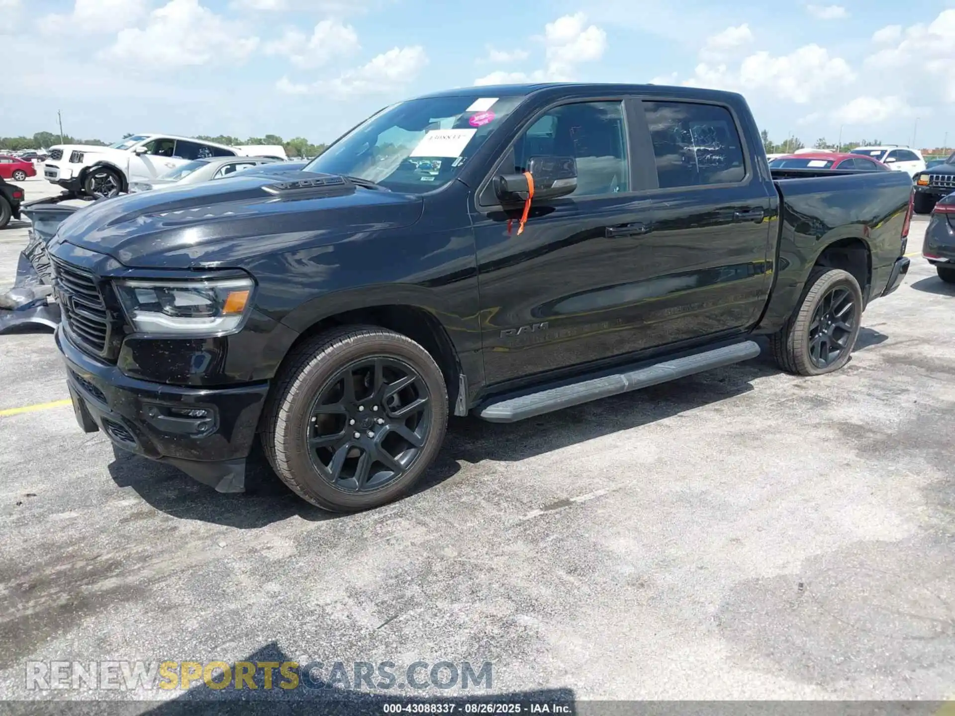 2 Photograph of a damaged car 1C6SRFJT2PN540528 RAM 1500 2023