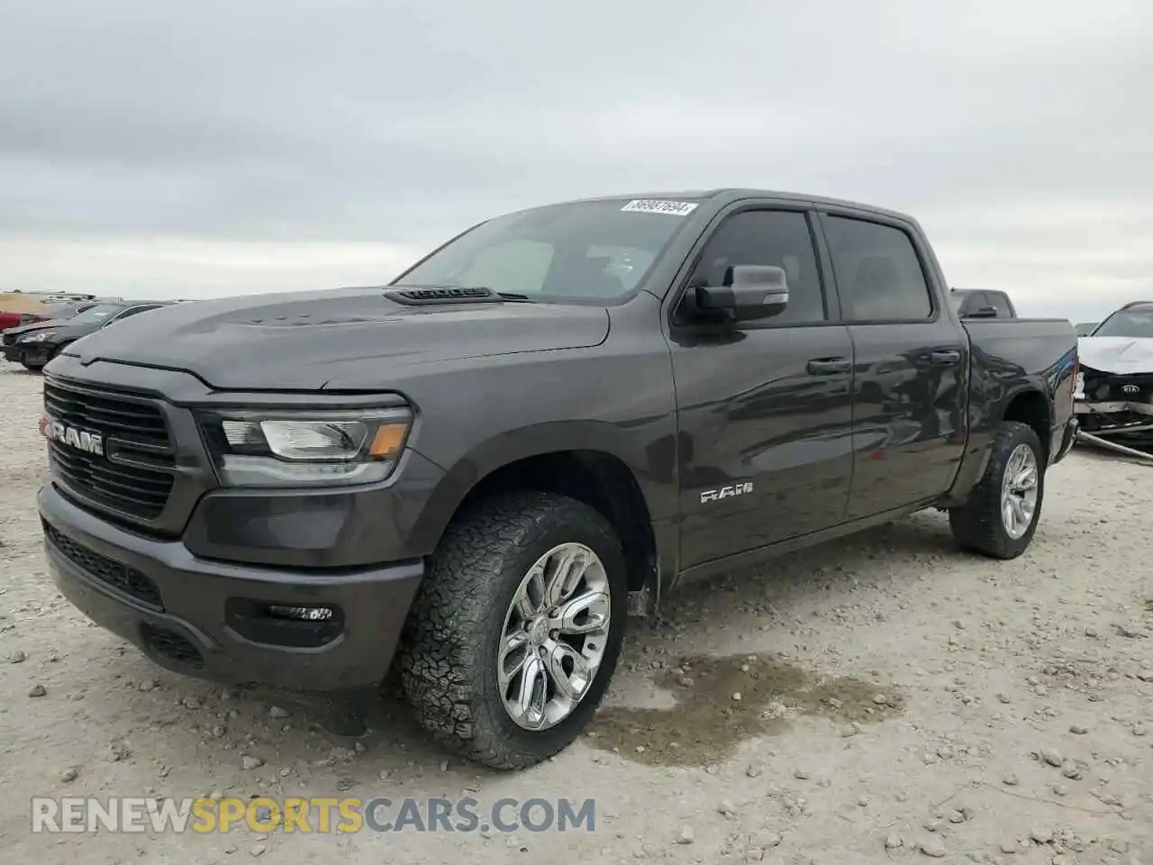 1 Photograph of a damaged car 1C6SRFJT2PN634618 RAM 1500 2023