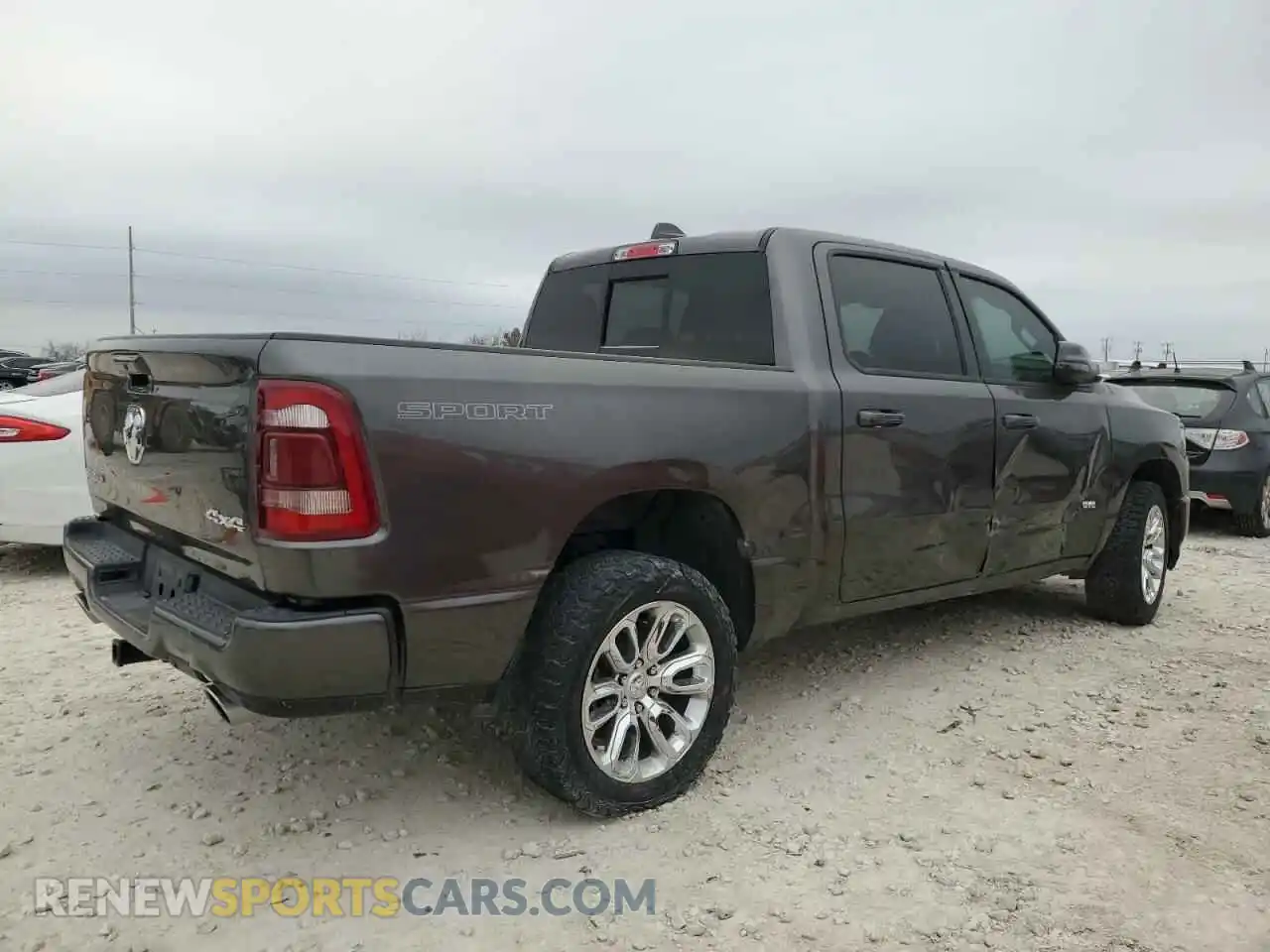 3 Photograph of a damaged car 1C6SRFJT2PN634618 RAM 1500 2023