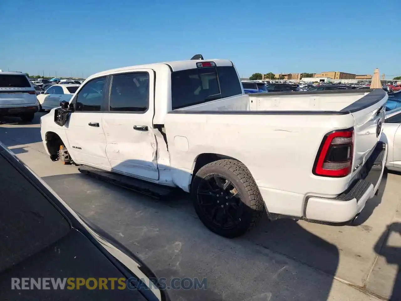 2 Photograph of a damaged car 1C6SRFJT3PN577460 RAM 1500 2023