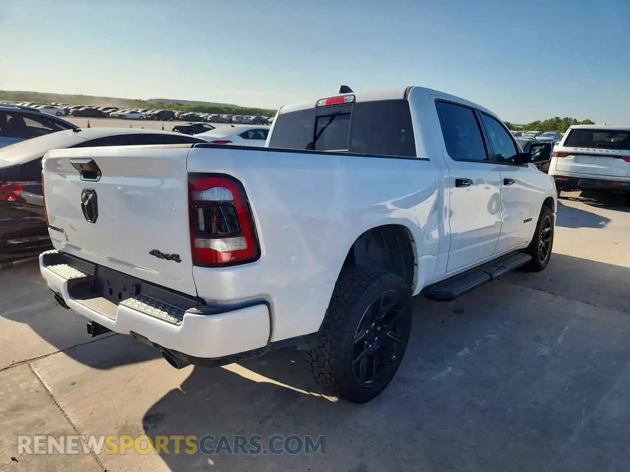 3 Photograph of a damaged car 1C6SRFJT3PN577460 RAM 1500 2023