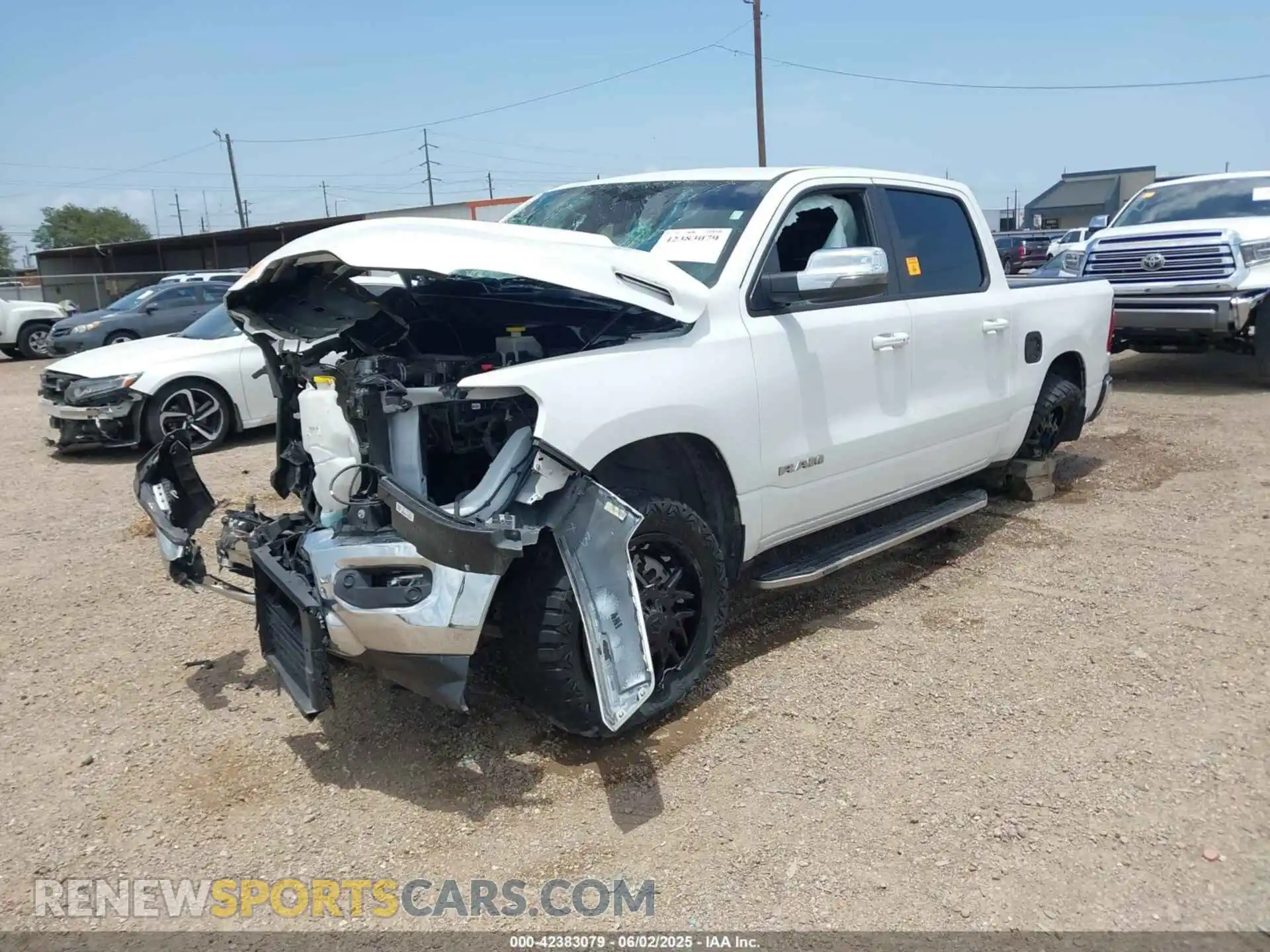 2 Photograph of a damaged car 1C6SRFJT3PN582111 RAM 1500 2023