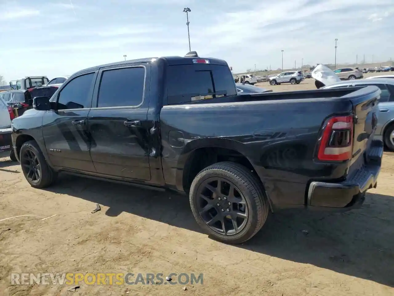 2 Photograph of a damaged car 1C6SRFJT4PN619442 RAM 1500 2023