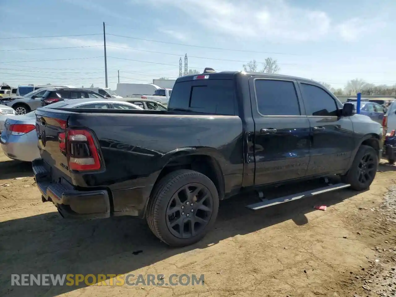 3 Photograph of a damaged car 1C6SRFJT4PN619442 RAM 1500 2023