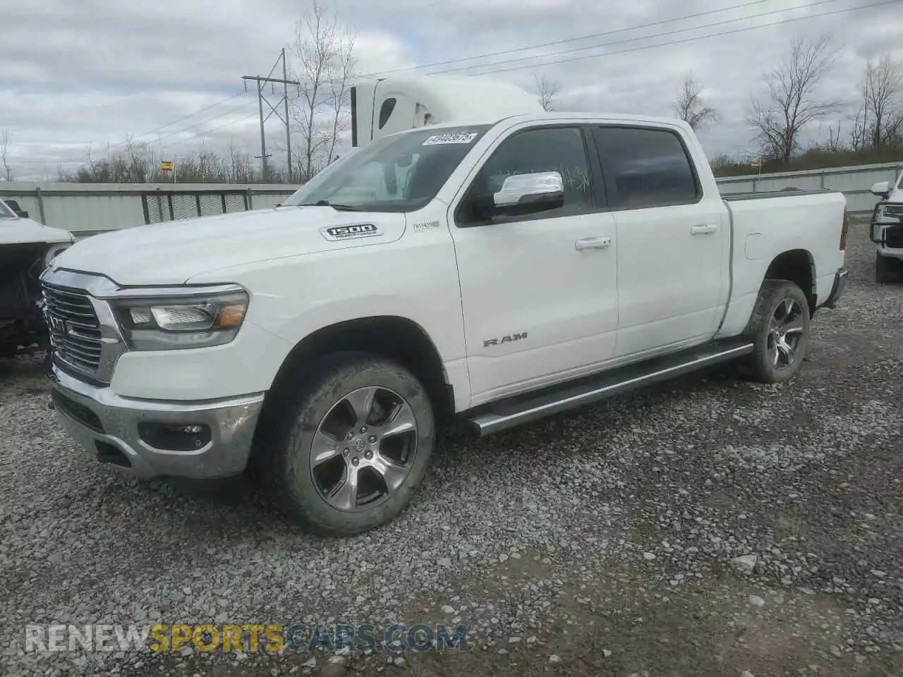 1 Photograph of a damaged car 1C6SRFJT5PN508592 RAM 1500 2023