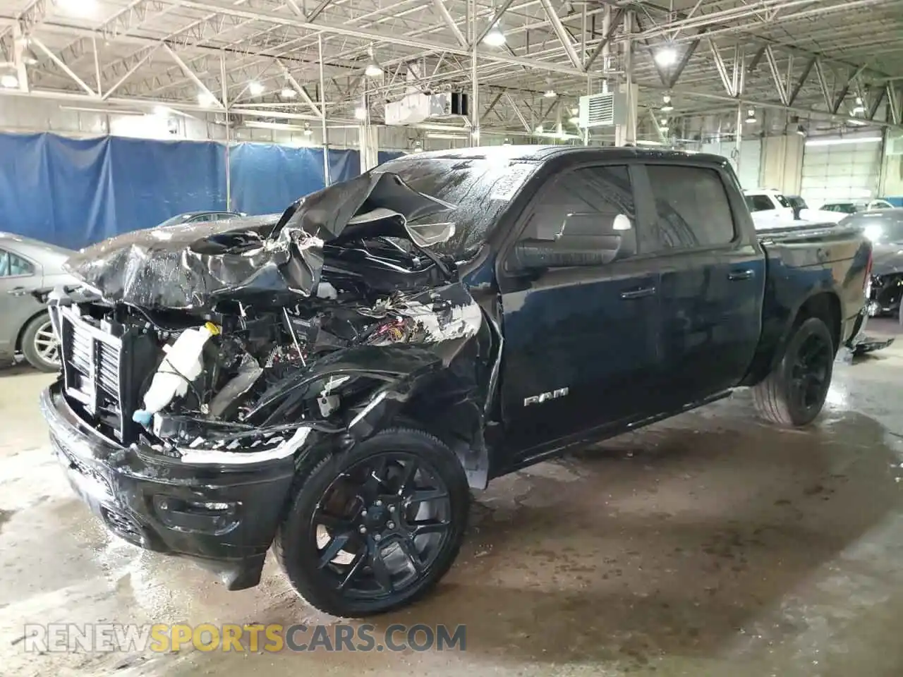 1 Photograph of a damaged car 1C6SRFJT6PN564752 RAM 1500 2023