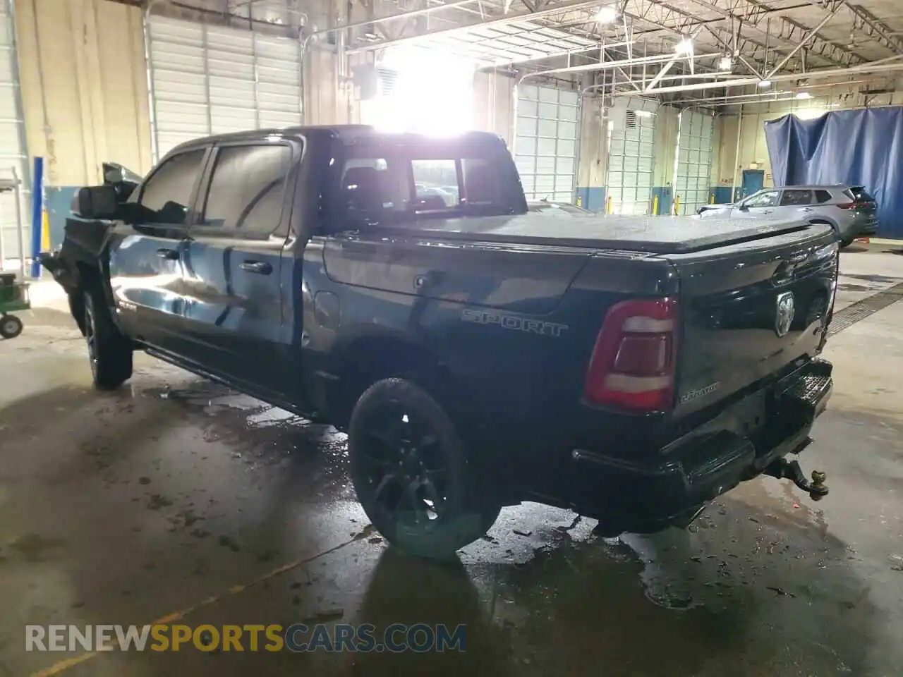 2 Photograph of a damaged car 1C6SRFJT6PN564752 RAM 1500 2023