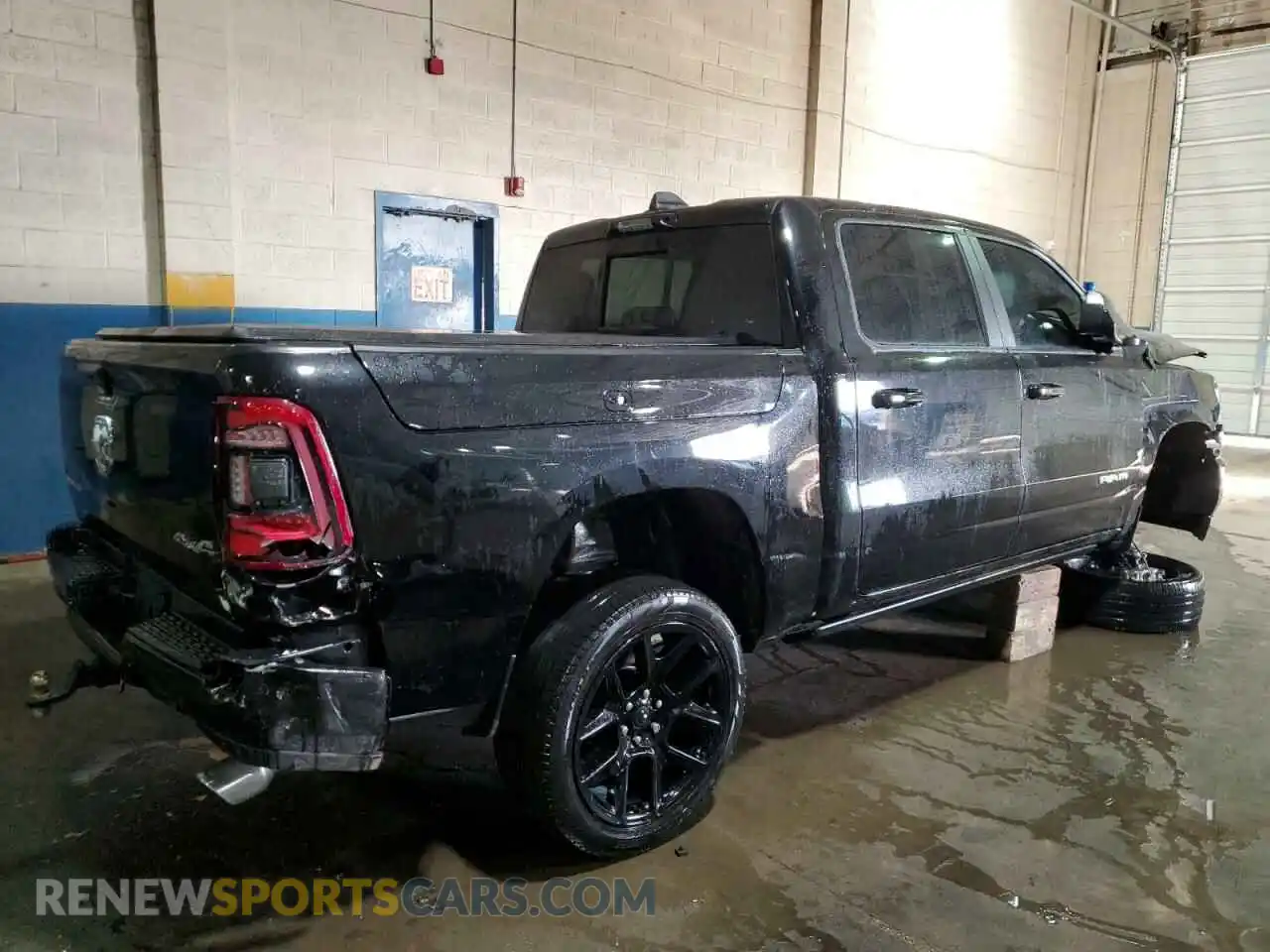 3 Photograph of a damaged car 1C6SRFJT6PN564752 RAM 1500 2023