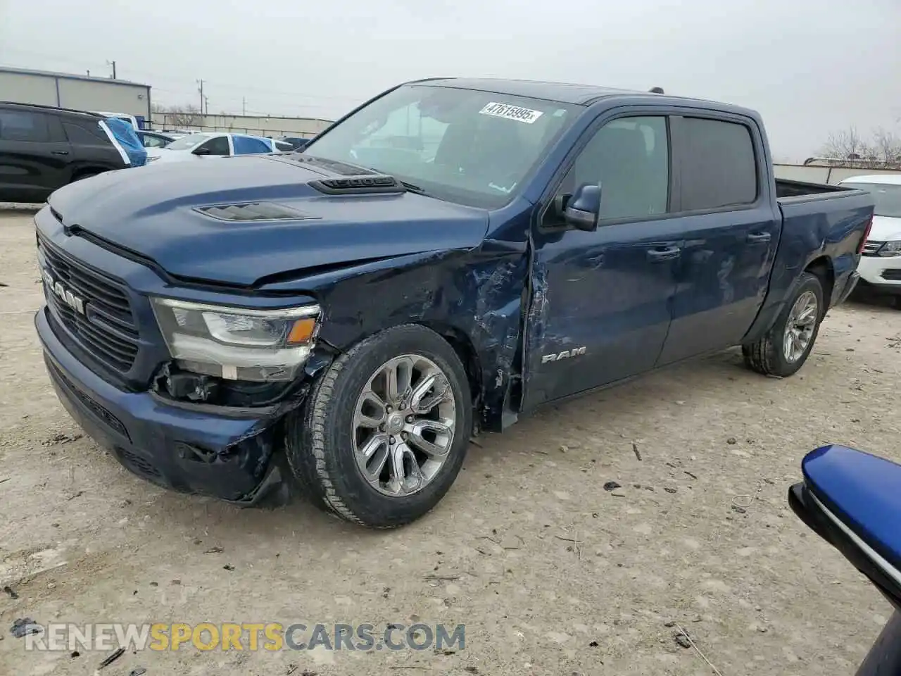 1 Photograph of a damaged car 1C6SRFJT7PN583150 RAM 1500 2023