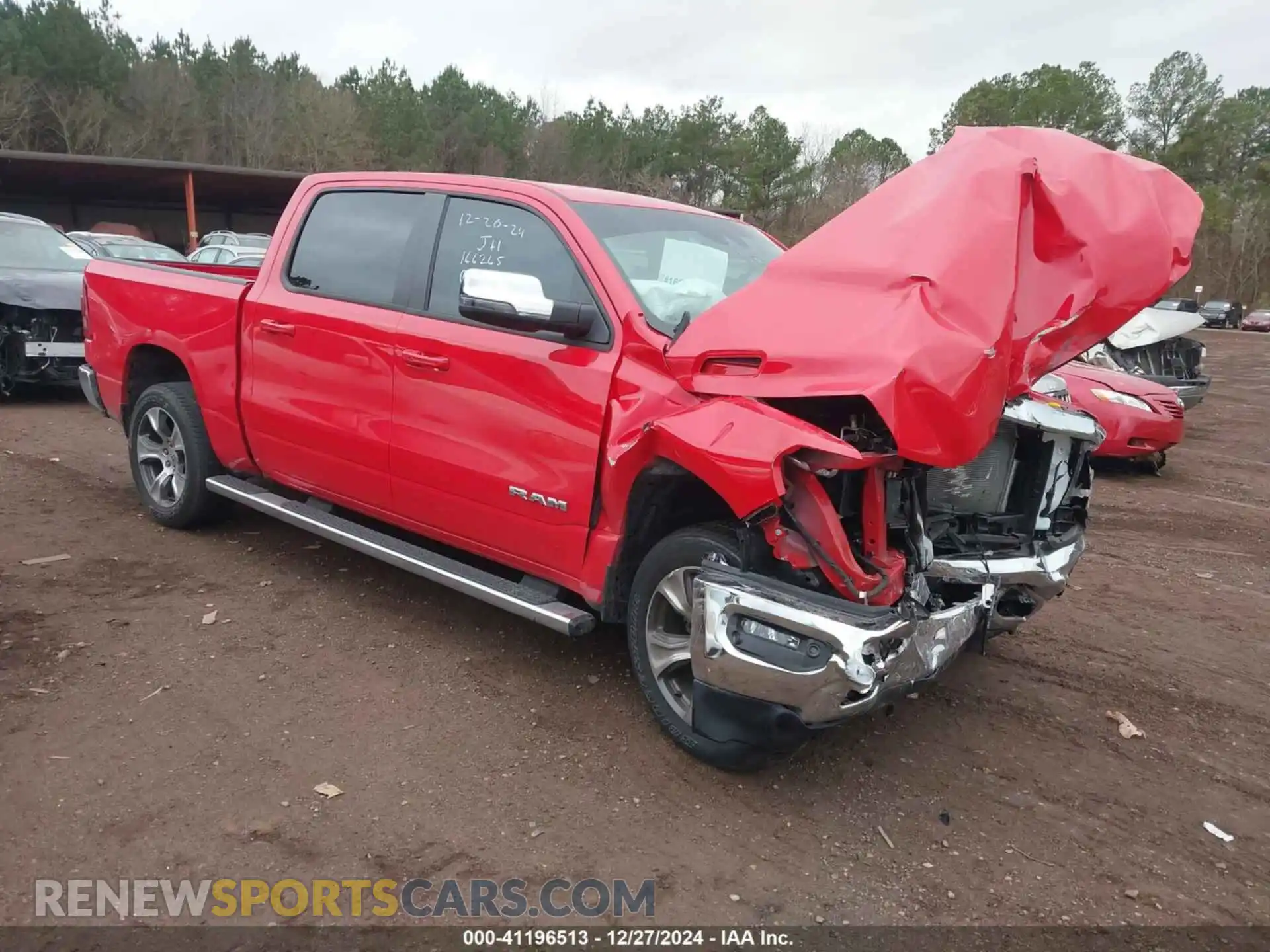 1 Photograph of a damaged car 1C6SRFJT7PN587831 RAM 1500 2023