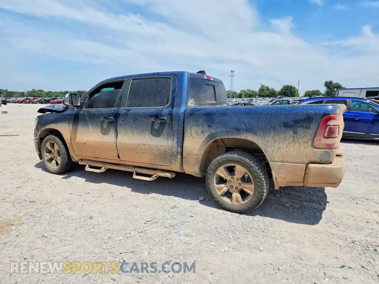 2 Photograph of a damaged car 1C6SRFJT8PN672631 RAM 1500 2023