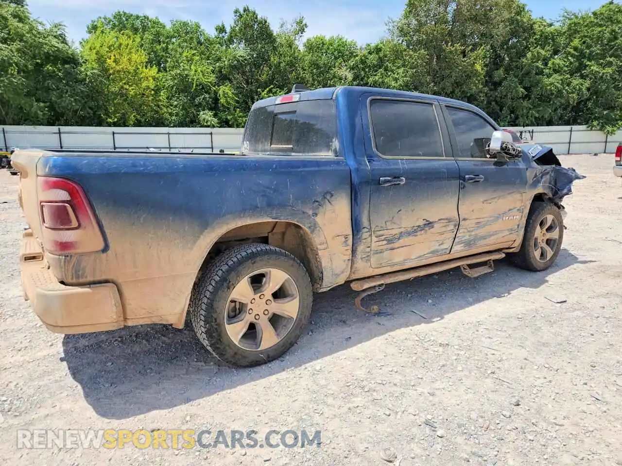 3 Photograph of a damaged car 1C6SRFJT8PN672631 RAM 1500 2023