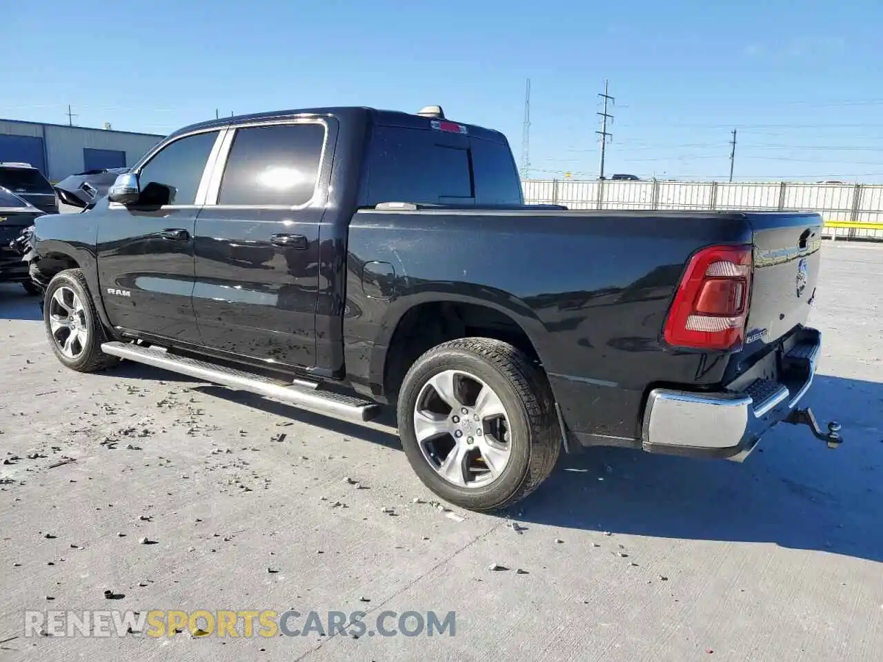 2 Photograph of a damaged car 1C6SRFJTXPN632289 RAM 1500 2023