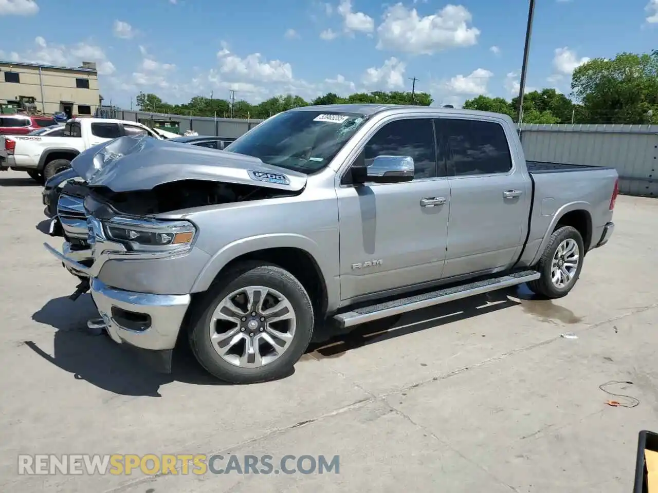 1 Photograph of a damaged car 1C6SRFKT1PN567038 RAM 1500 2023