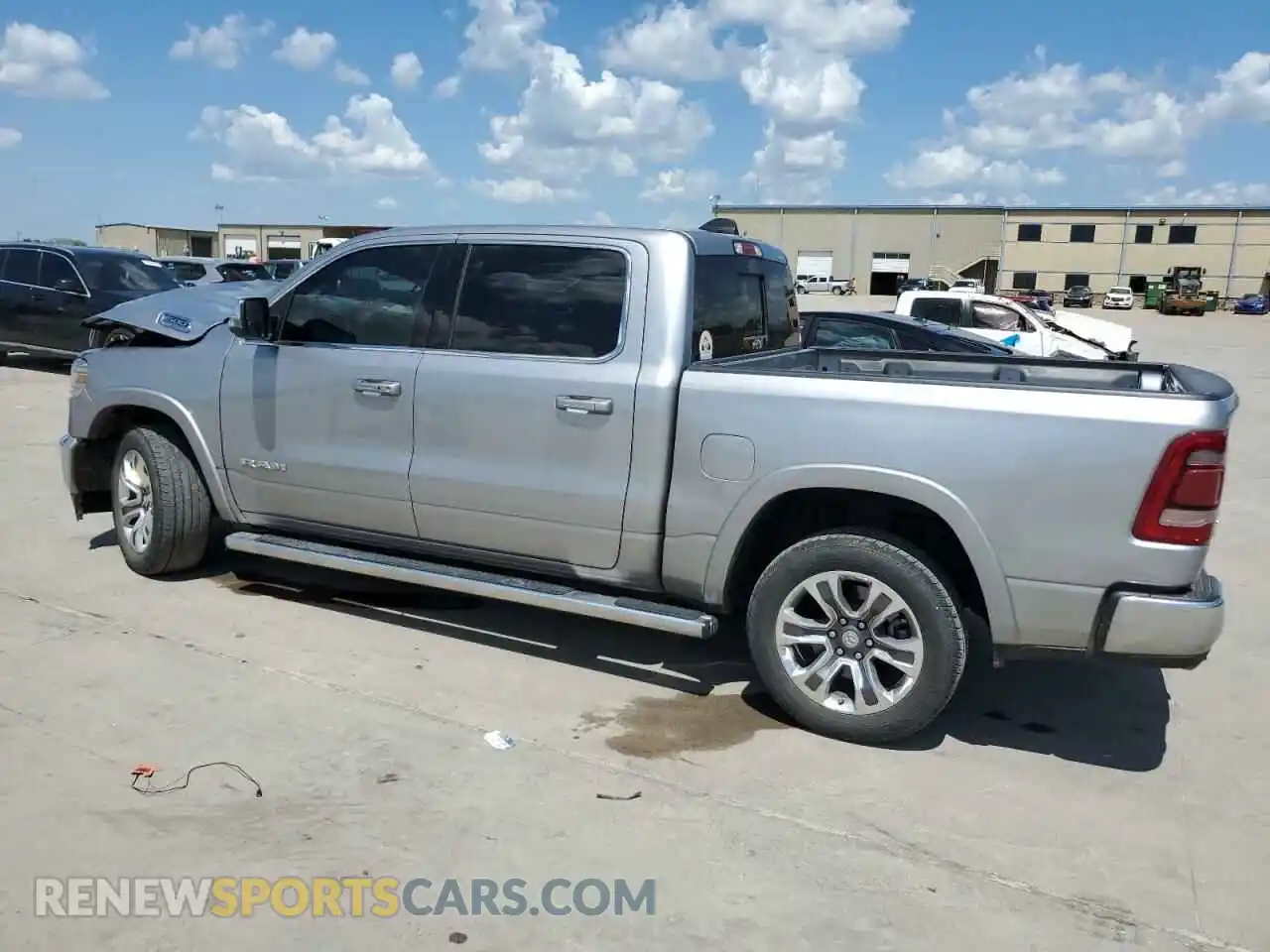 2 Photograph of a damaged car 1C6SRFKT1PN567038 RAM 1500 2023