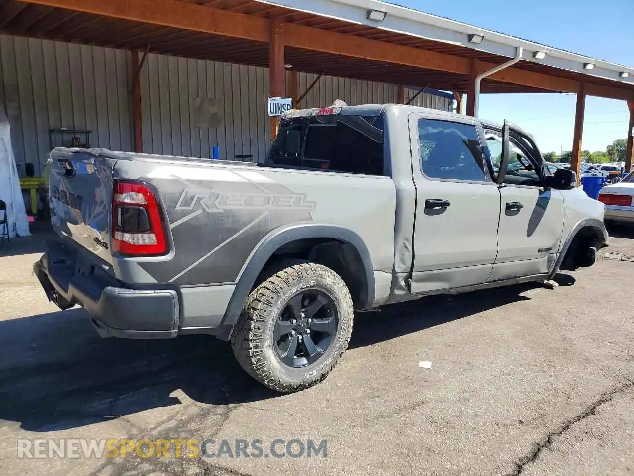 3 Photograph of a damaged car 1C6SRFLT1PN654842 RAM 1500 2023