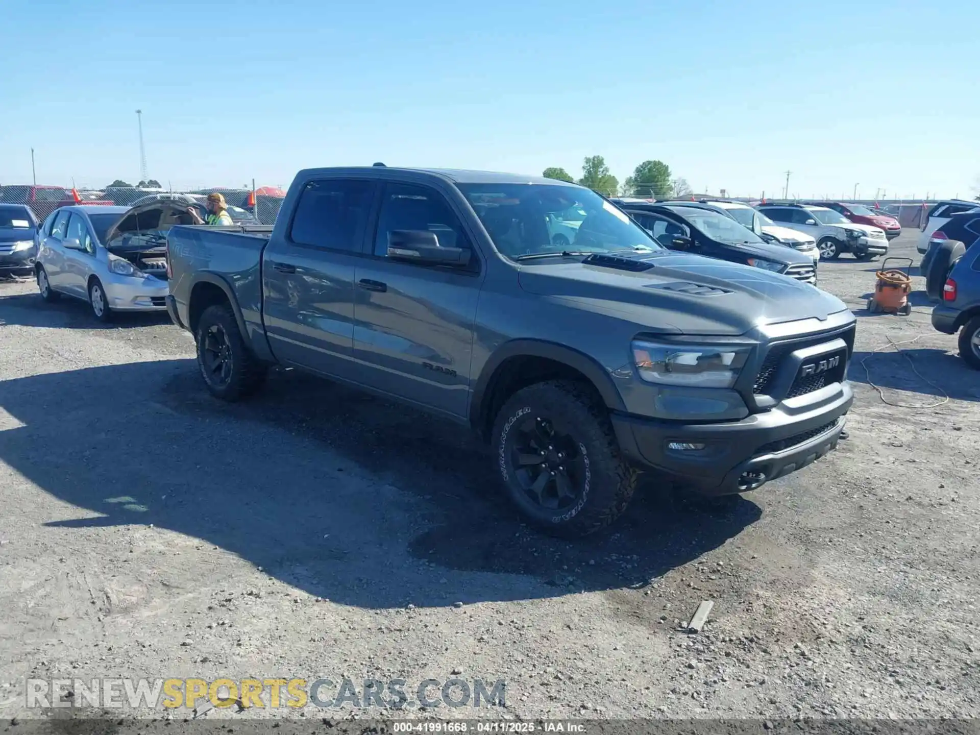 1 Photograph of a damaged car 1C6SRFLT2PN677577 RAM 1500 2023