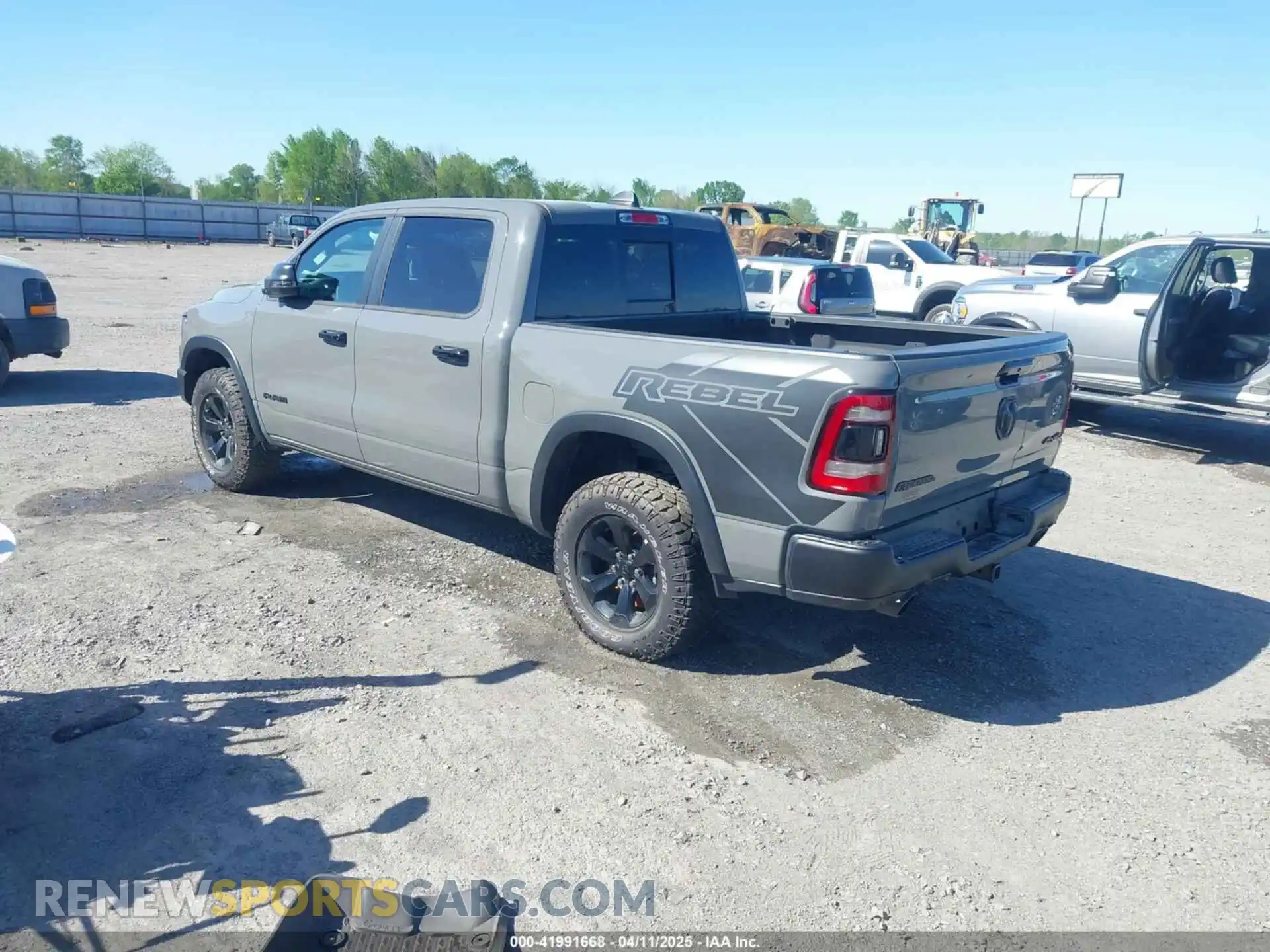 3 Photograph of a damaged car 1C6SRFLT2PN677577 RAM 1500 2023