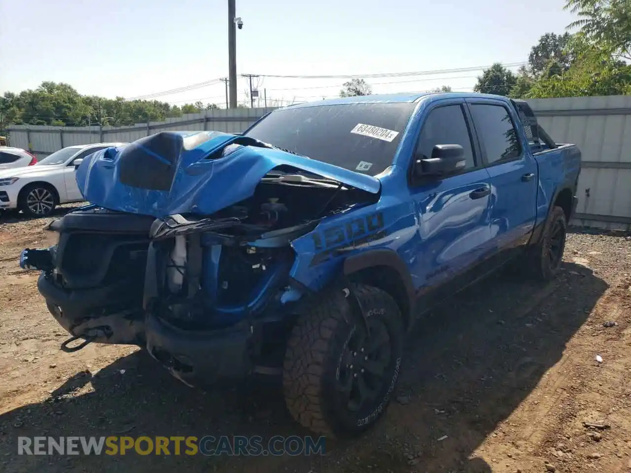 1 Photograph of a damaged car 1C6SRFLT5PN590742 RAM 1500 2023