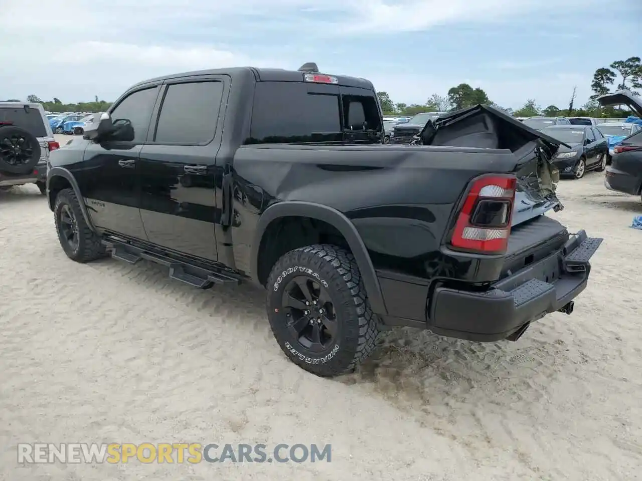 2 Photograph of a damaged car 1C6SRFLT8PN609879 RAM 1500 2023