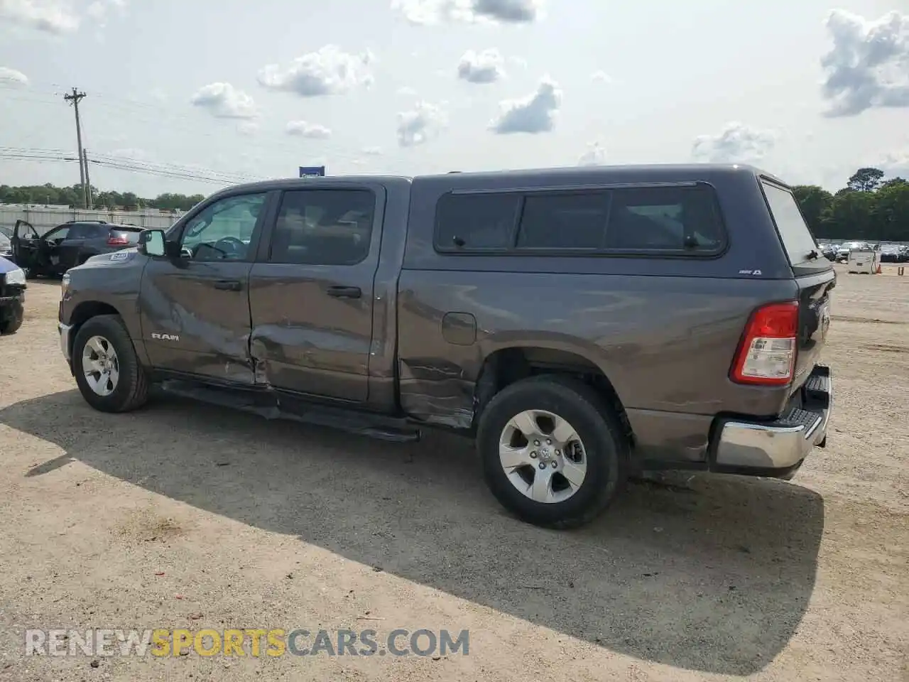 2 Photograph of a damaged car 1C6SRFMT2PN639037 RAM 1500 2023