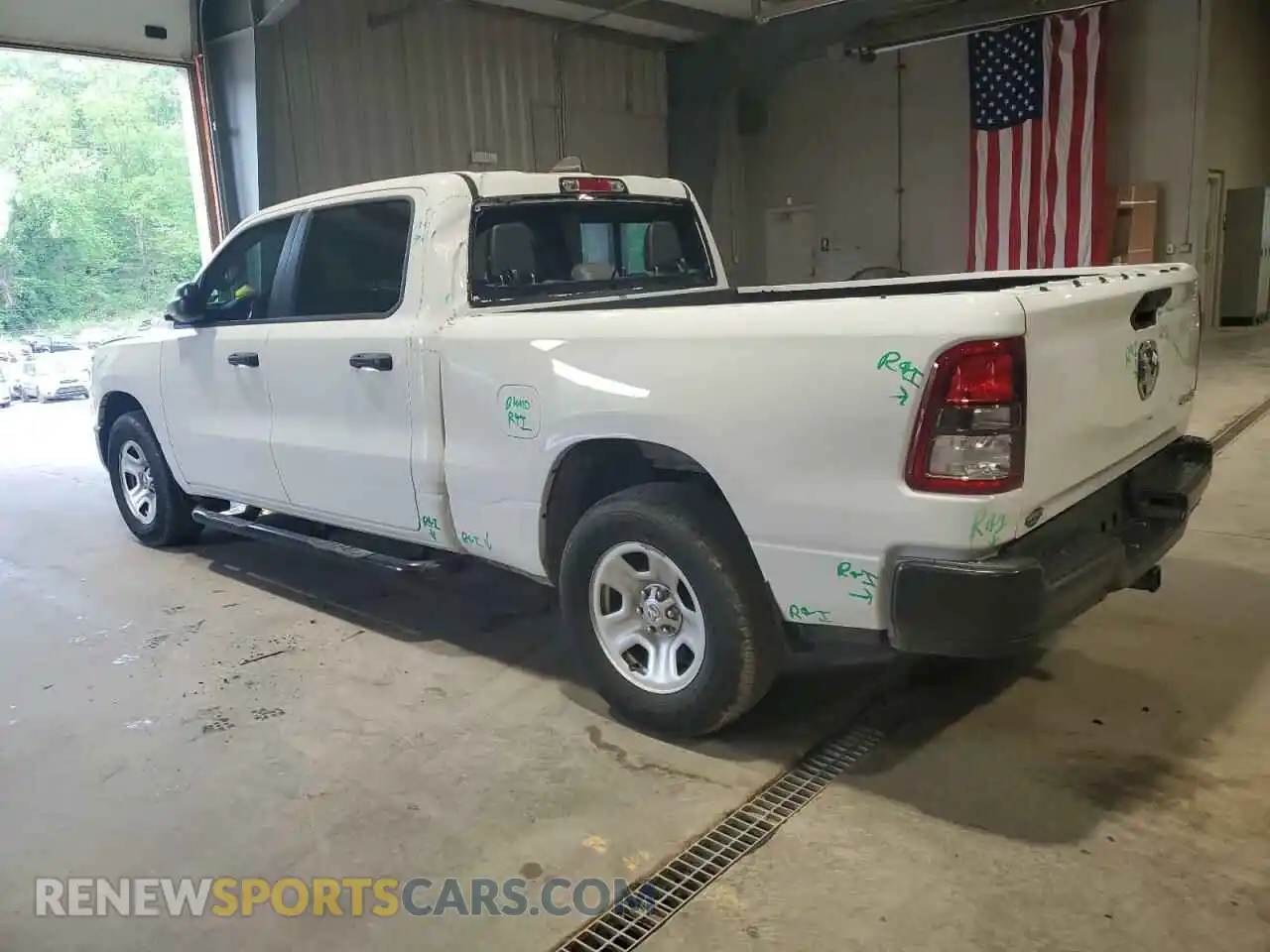 2 Photograph of a damaged car 1C6SRFNT1PN537324 RAM 1500 2023