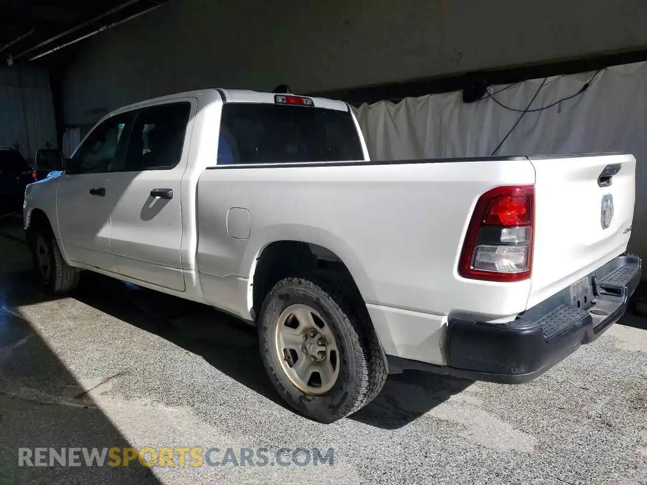 2 Photograph of a damaged car 1C6SRFNT1PN560568 RAM 1500 2023