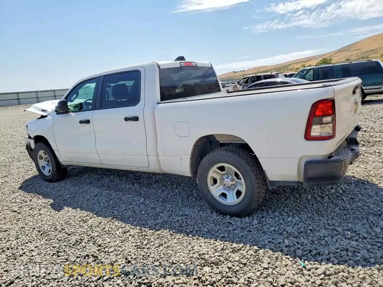 2 Photograph of a damaged car 1C6SRFNT6PN574739 RAM 1500 2023