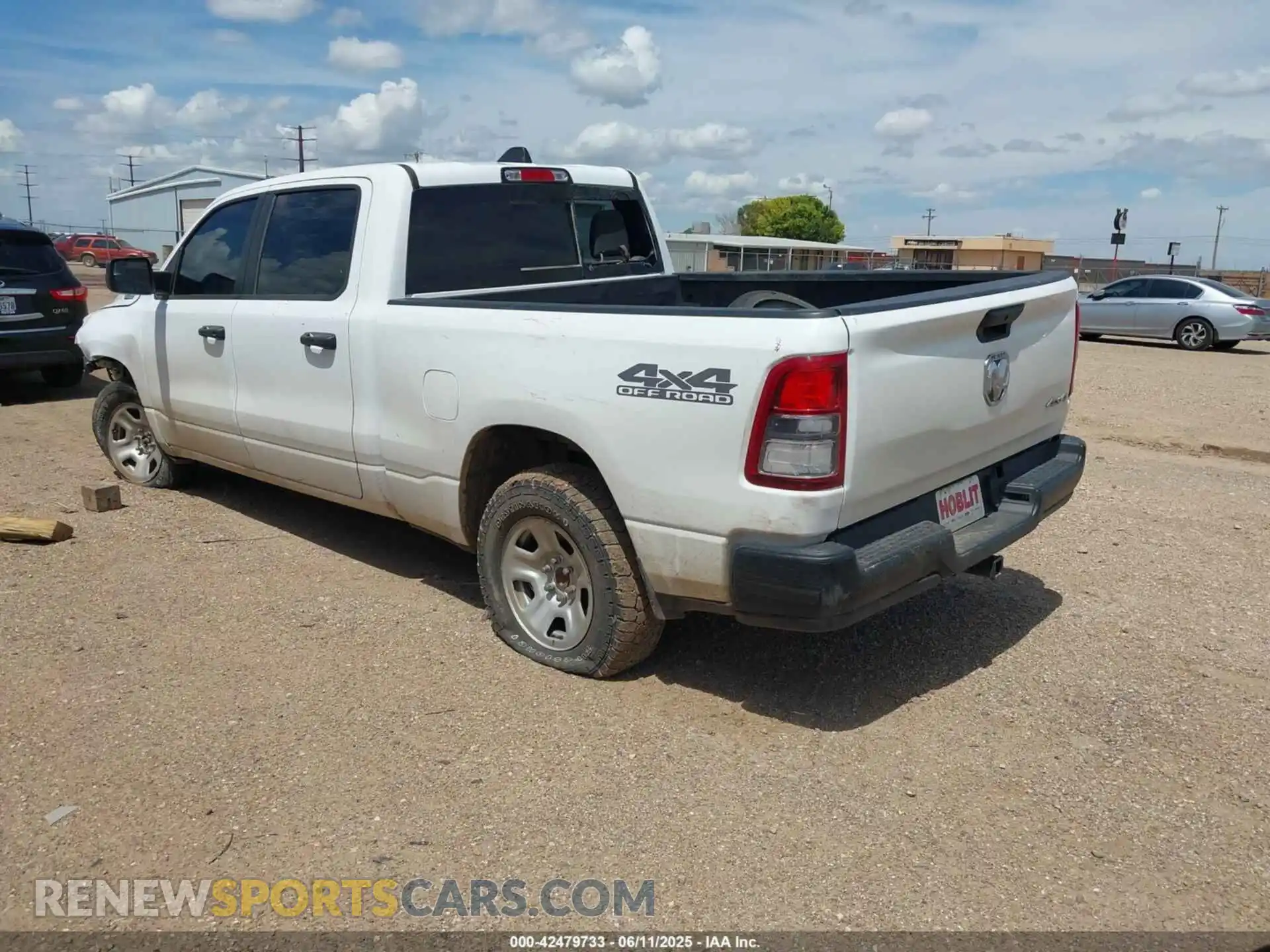 3 Photograph of a damaged car 1C6SRFNT7PN593705 RAM 1500 2023