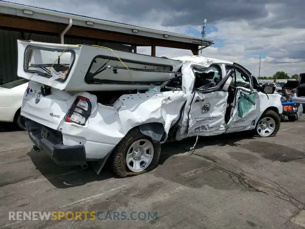 3 Photograph of a damaged car 1C6SRFNTXPN566160 RAM 1500 2023