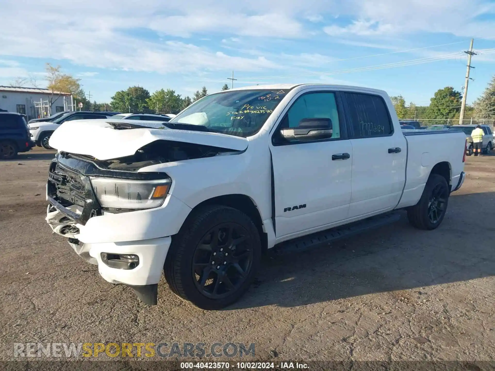 2 Photograph of a damaged car 1C6SRFRT2PN630265 RAM 1500 2023