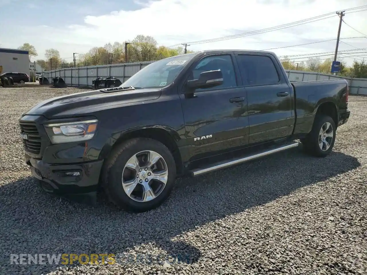 1 Photograph of a damaged car 1C6SRFRT5PN522190 RAM 1500 2023