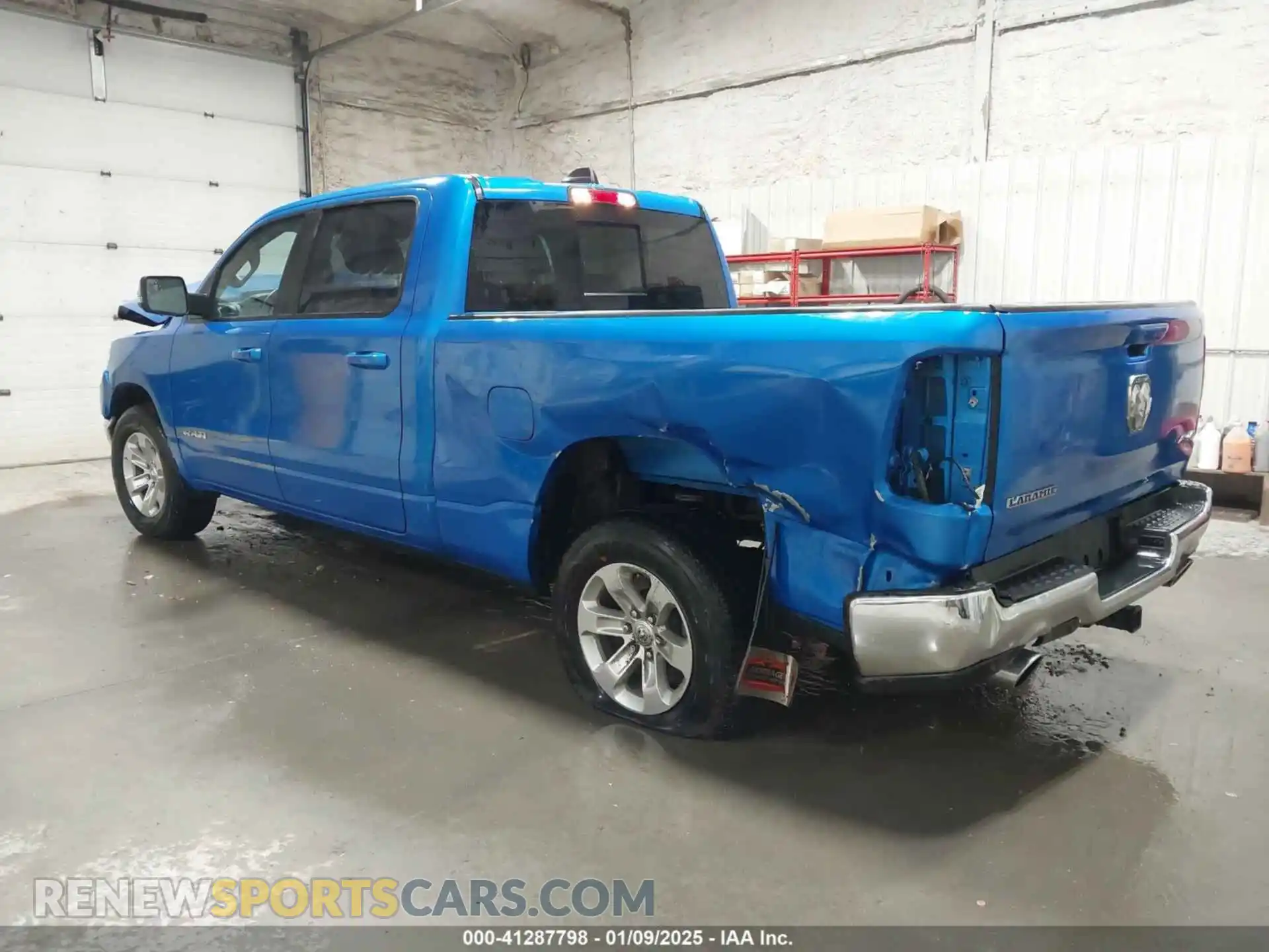 3 Photograph of a damaged car 1C6SRFRT7PN667277 RAM 1500 2023