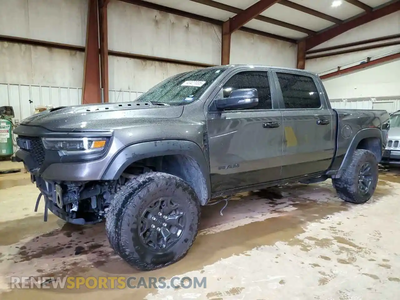 1 Photograph of a damaged car 1C6SRFU93PN500622 RAM 1500 2023