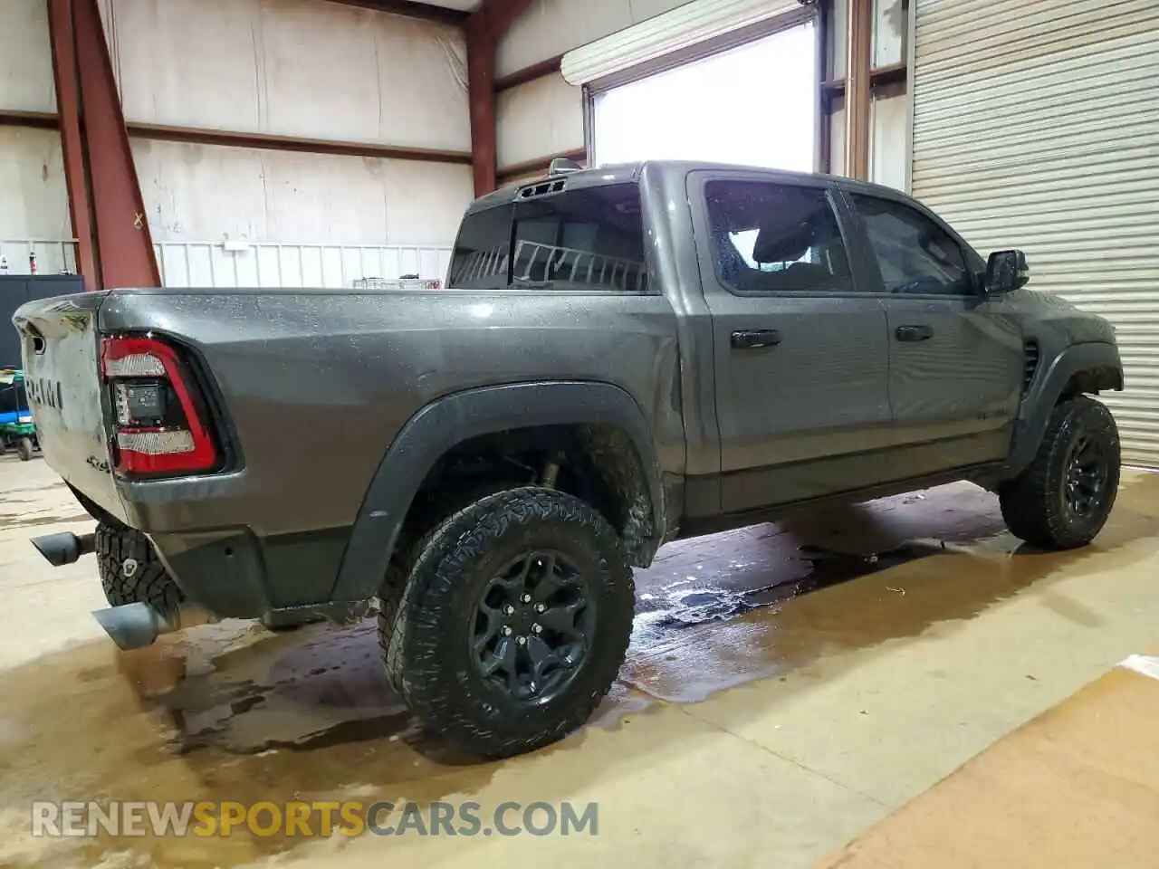 3 Photograph of a damaged car 1C6SRFU93PN500622 RAM 1500 2023