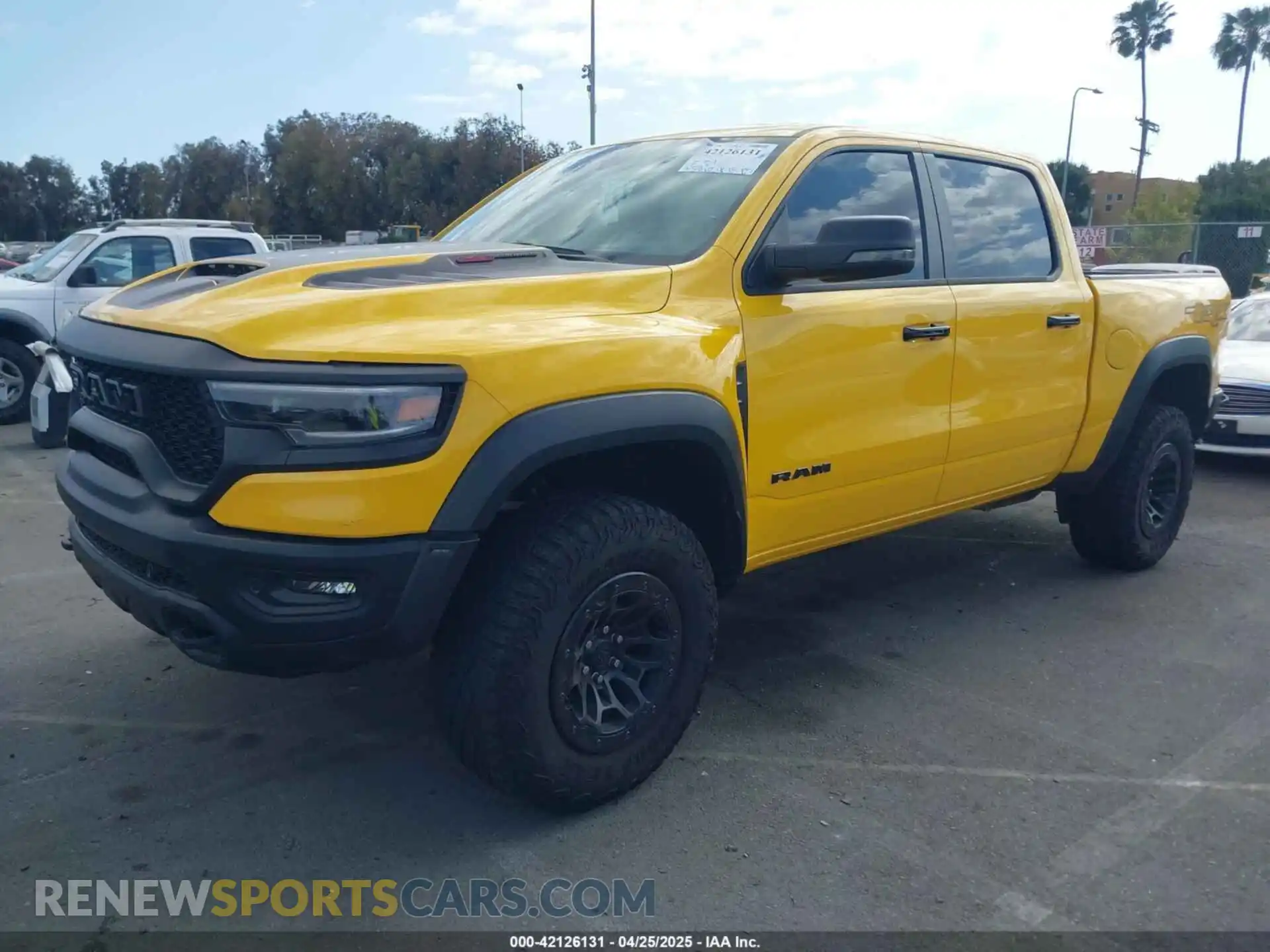 2 Photograph of a damaged car 1C6SRFU93PN546838 RAM 1500 2023