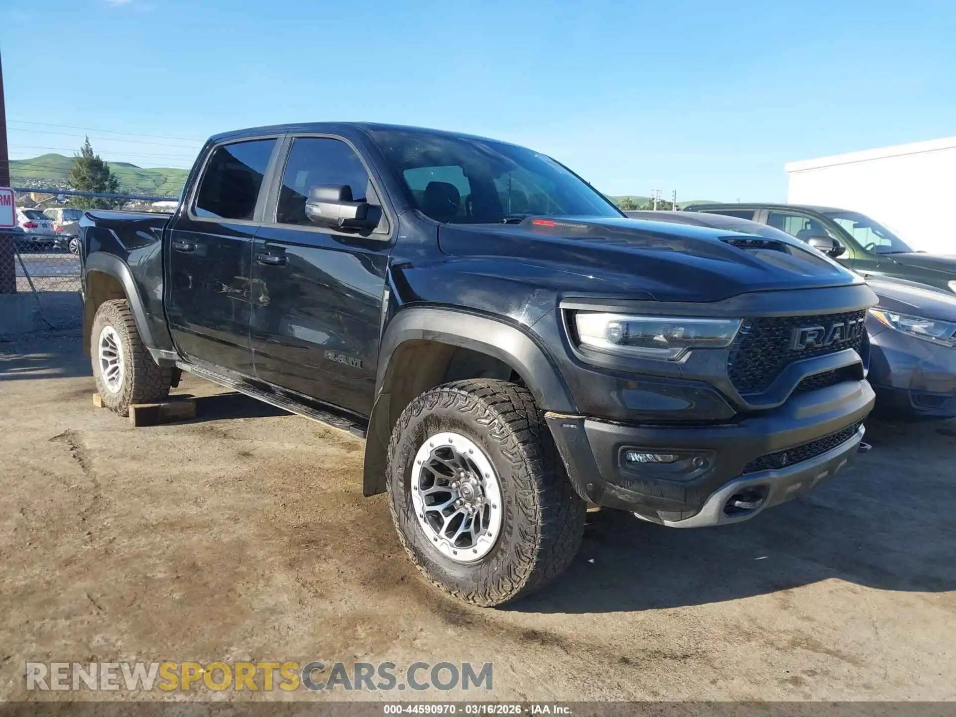 1 Photograph of a damaged car 1C6SRFU93PN564188 RAM 1500 2023
