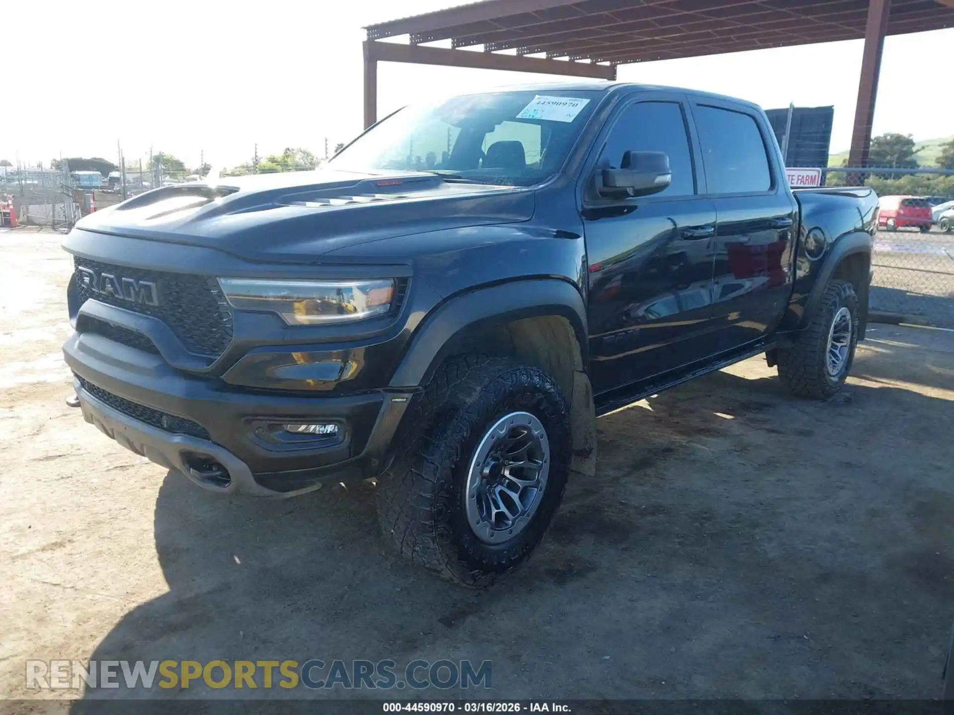 2 Photograph of a damaged car 1C6SRFU93PN564188 RAM 1500 2023