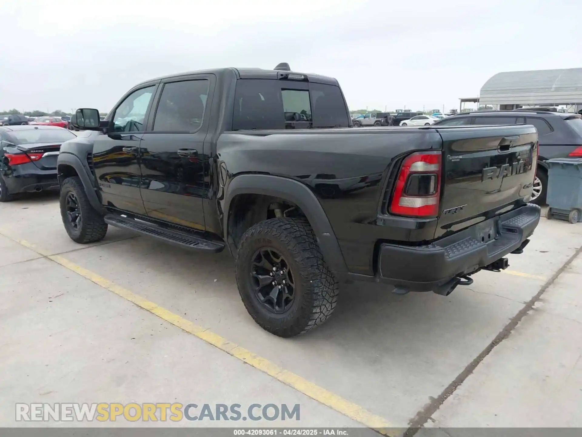 3 Photograph of a damaged car 1C6SRFU93PN572940 RAM 1500 2023