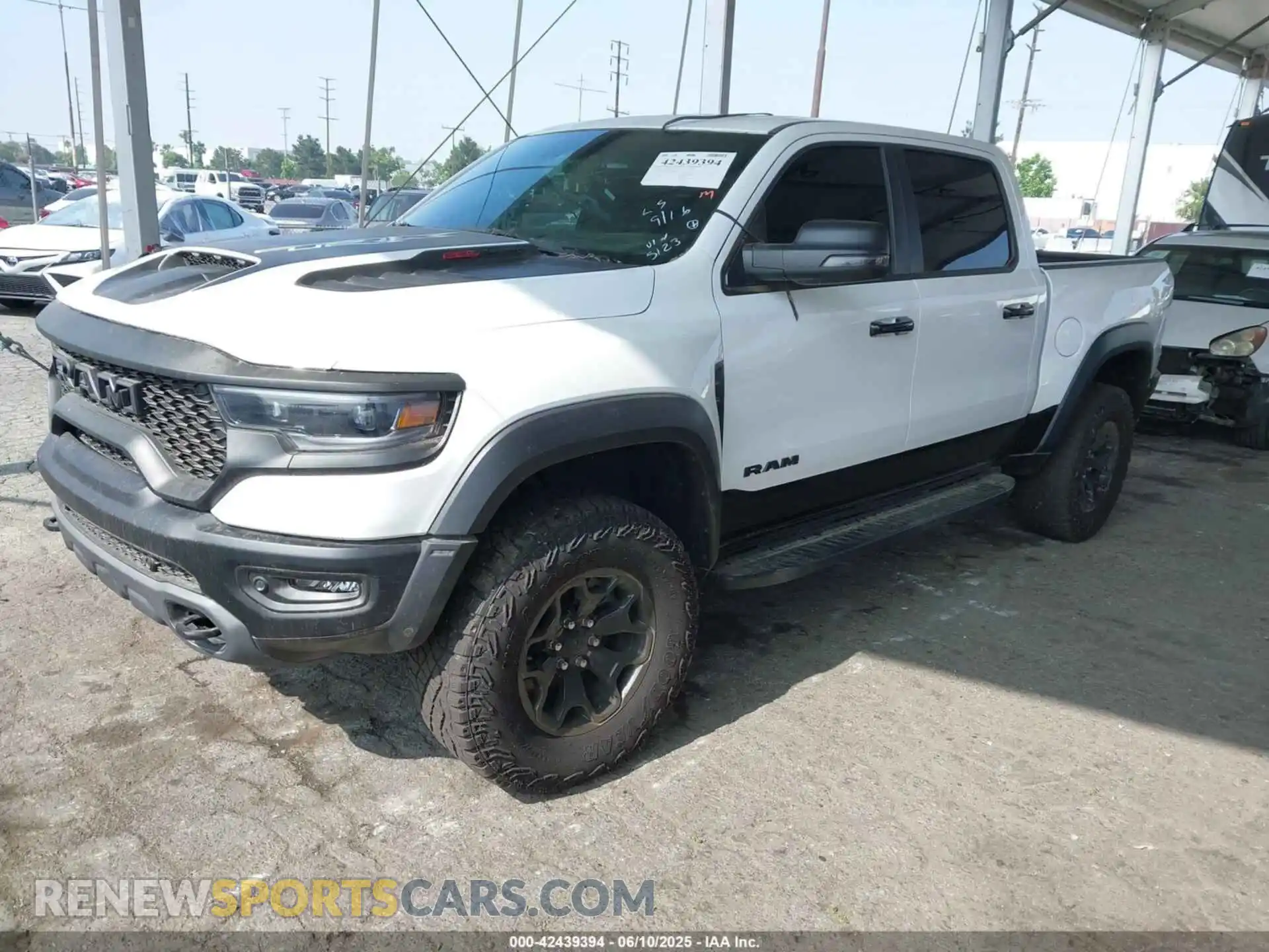 2 Photograph of a damaged car 1C6SRFU93PN585123 RAM 1500 2023