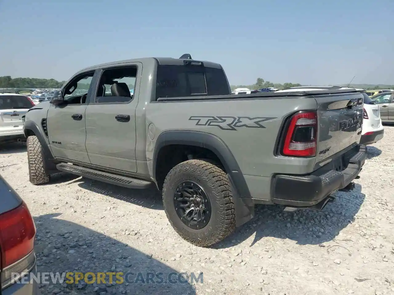 2 Photograph of a damaged car 1C6SRFU97PN695494 RAM 1500 2023