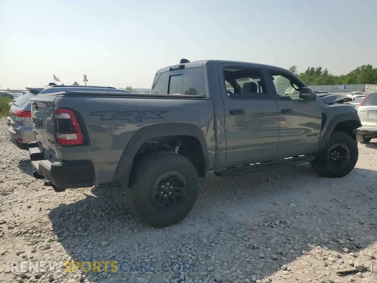 3 Photograph of a damaged car 1C6SRFU97PN695494 RAM 1500 2023