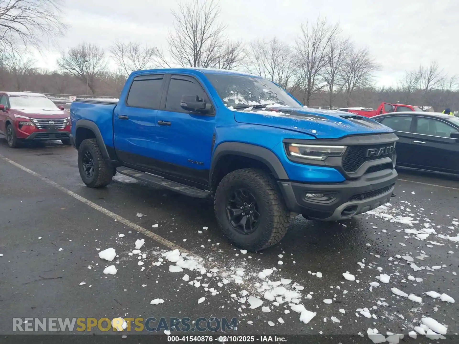 1 Photograph of a damaged car 1C6SRFU98PN529971 RAM 1500 2023