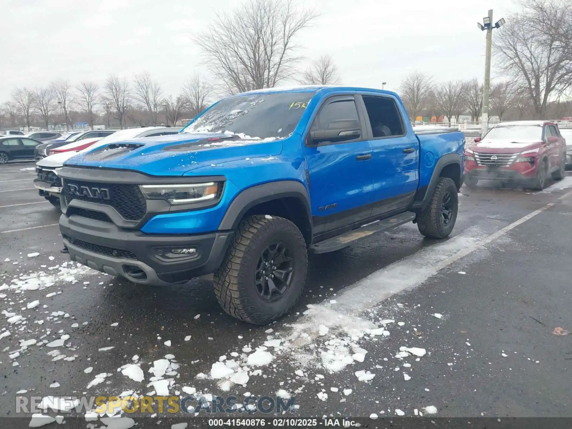 2 Photograph of a damaged car 1C6SRFU98PN529971 RAM 1500 2023