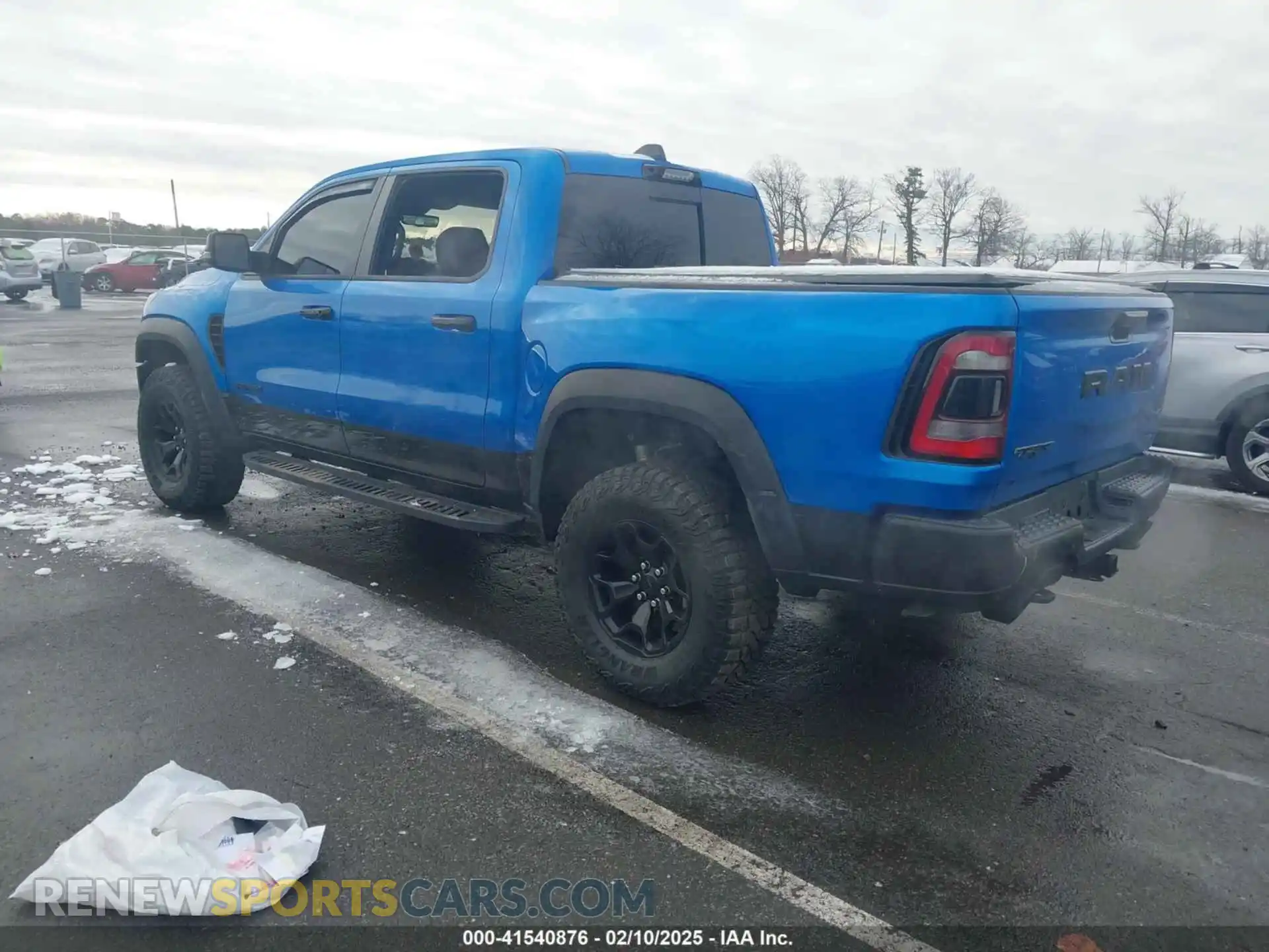 3 Photograph of a damaged car 1C6SRFU98PN529971 RAM 1500 2023