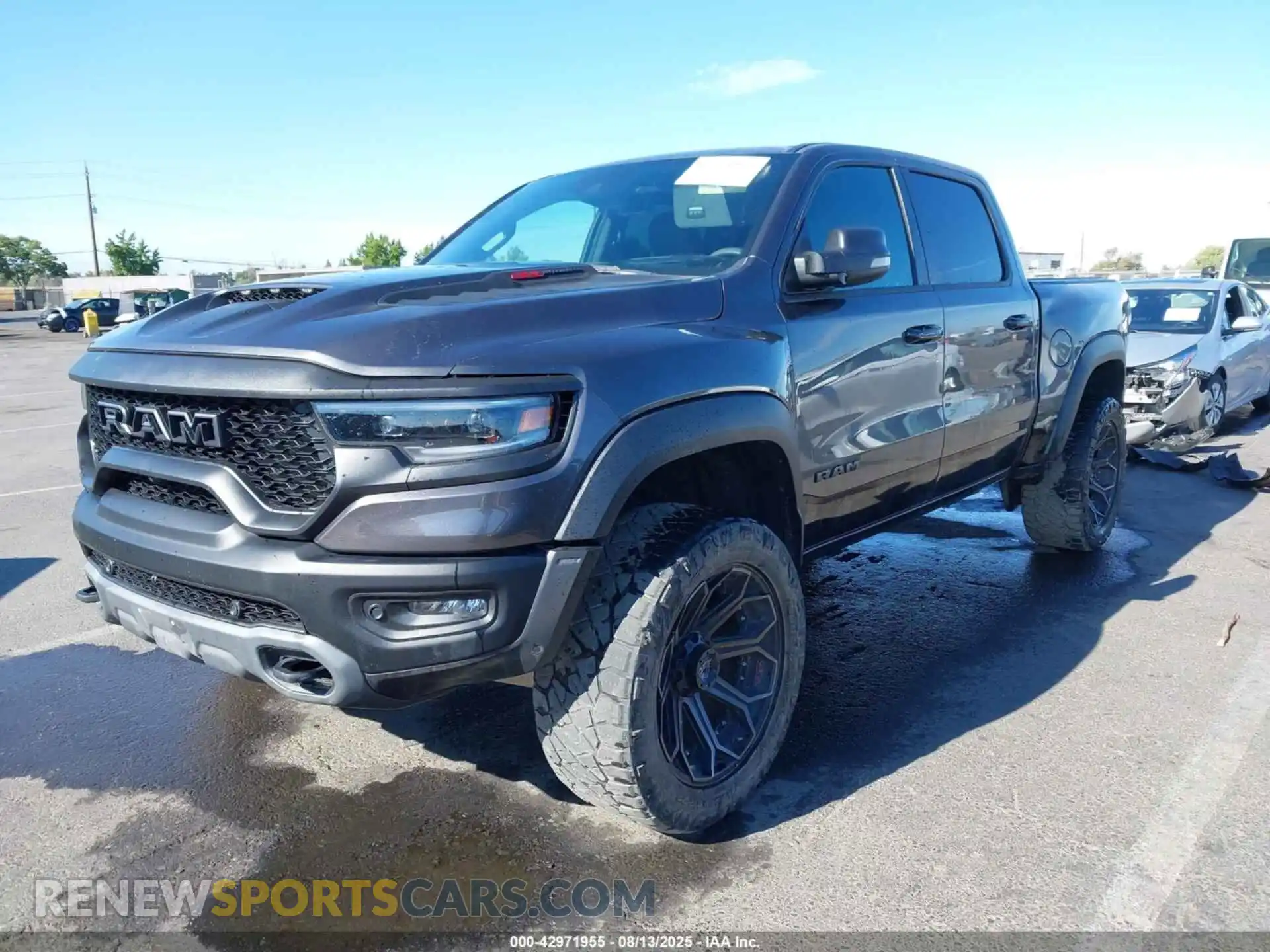2 Photograph of a damaged car 1C6SRFU99PN500611 RAM 1500 2023